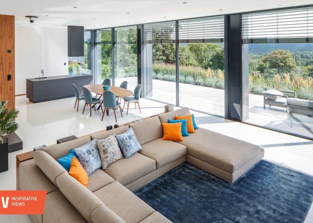 Schüco-alumínium-keret-nélküli-tolóajtó-frameless-slide-door-porsche-design-PD77-minimal-house-interior-nappali-beltér